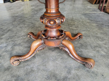 Antique Victorian walnut oval serpentine pedestal dining table