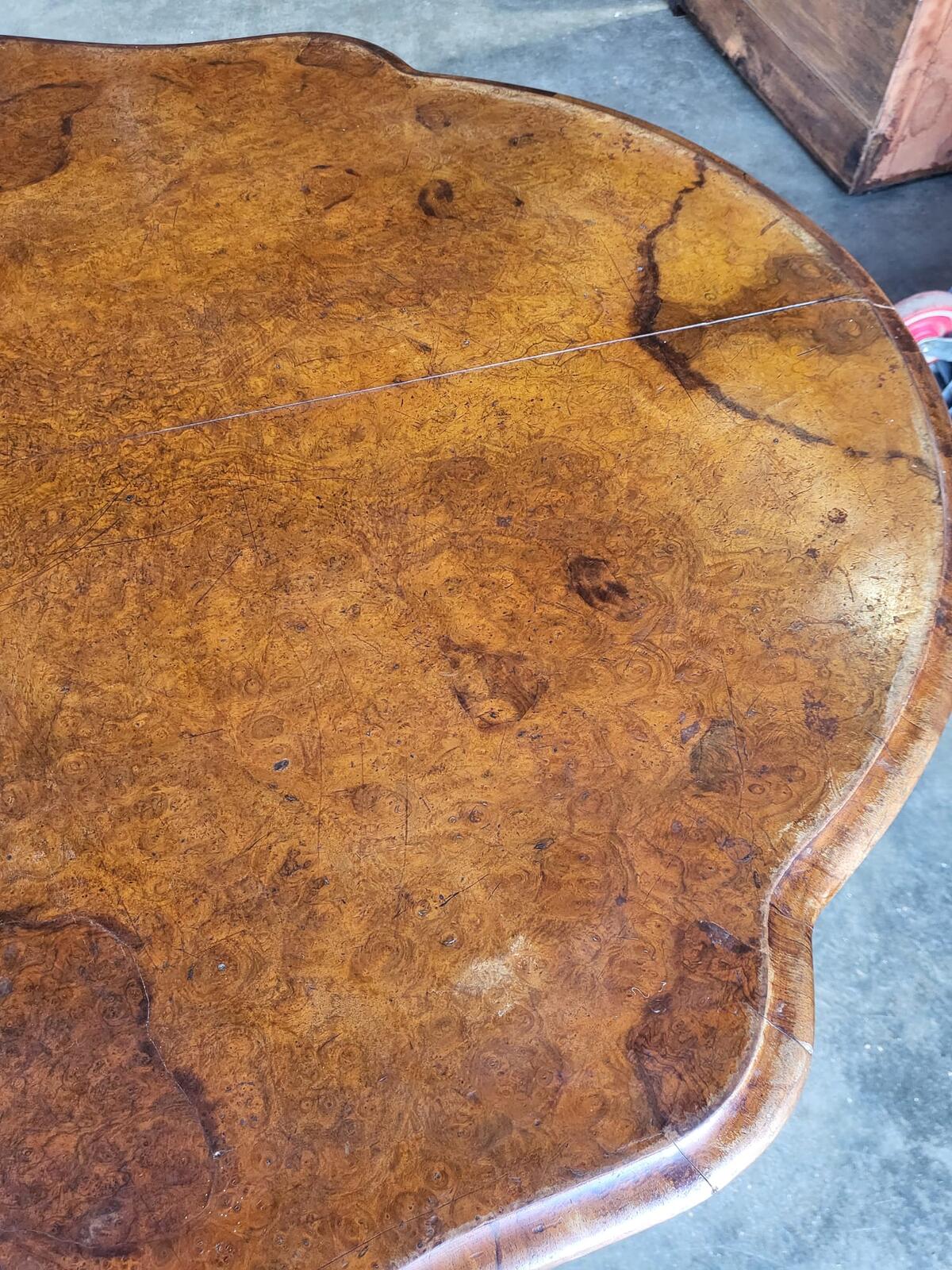 Antique Victorian walnut oval serpentine pedestal dining table