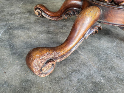 Antique Victorian walnut oval serpentine pedestal dining table