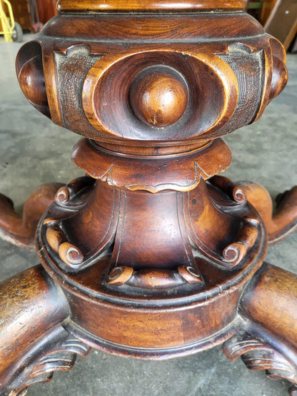 Antique Victorian walnut oval serpentine pedestal dining table