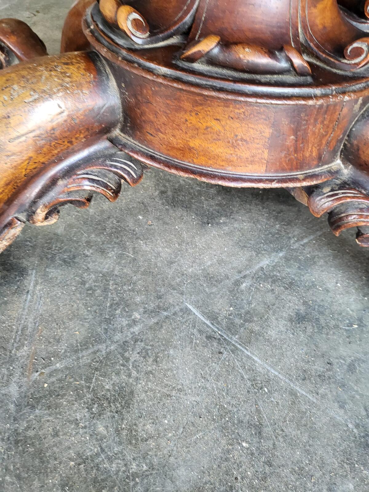 Antique Victorian walnut oval serpentine pedestal dining table