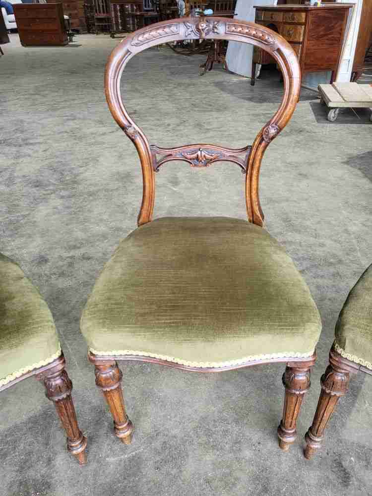 Four antique Victorian ballon back dining chairs green