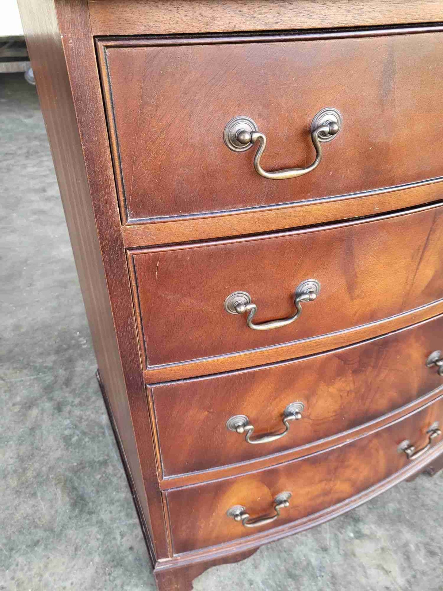 Antique repro small bow front chest of 4 drawers