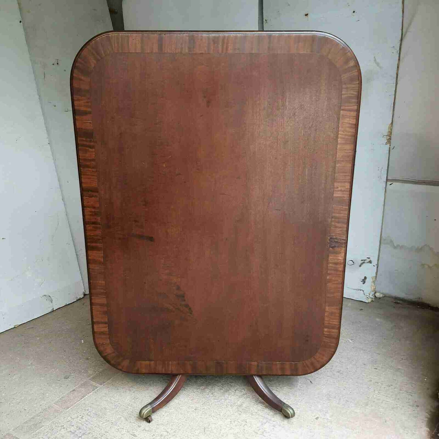 antique Georgian mahogany rectangular tilt top dining table quad legs castors 6