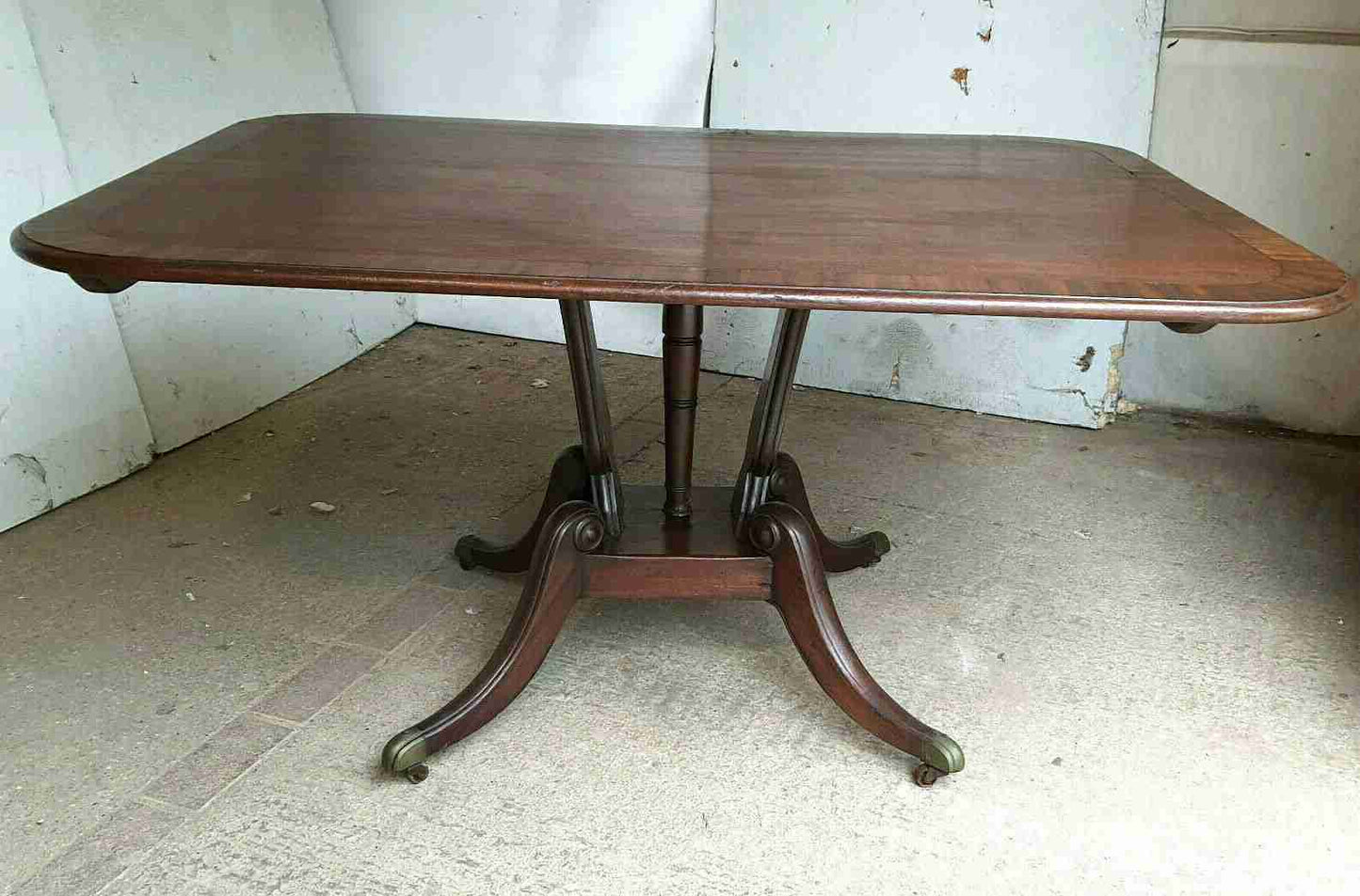 antique Georgian mahogany rectangular tilt top dining table quad legs castors 6