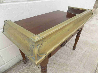 Antique fireplace fender in brass