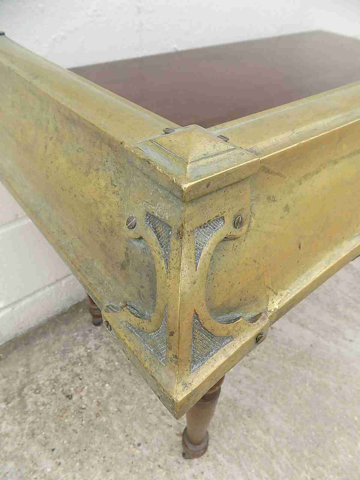 Antique fireplace fender in brass