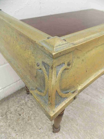 Antique fireplace fender in brass