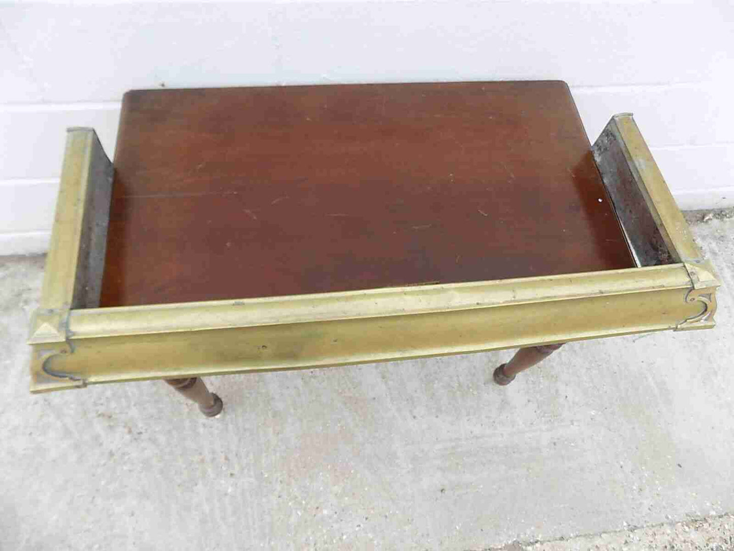 Antique fireplace fender in brass