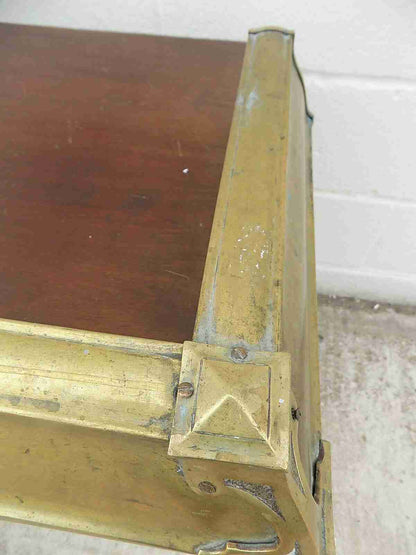 Antique fireplace fender in brass