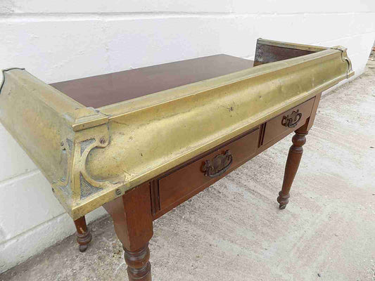 Antique fireplace fender in brass