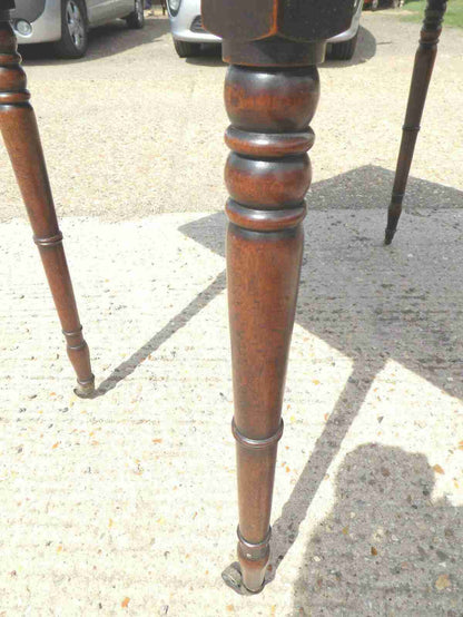Antique Victorian mahogany extending Pembroke table with drop sides