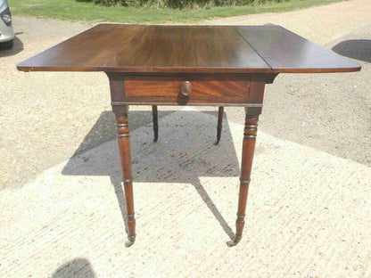 Antique Victorian mahogany extending Pembroke table with drop sides