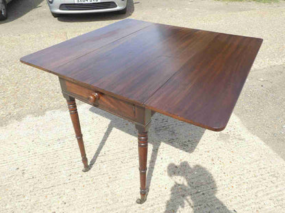 Antique Victorian mahogany extending Pembroke table with drop sides