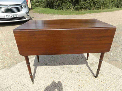 Antique Victorian mahogany extending Pembroke table with drop sides