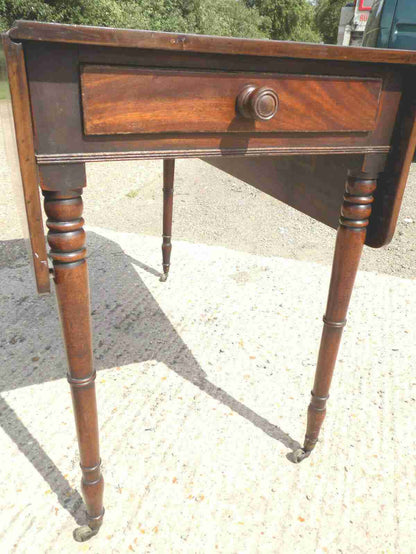 Antique Victorian mahogany extending Pembroke table with drop sides