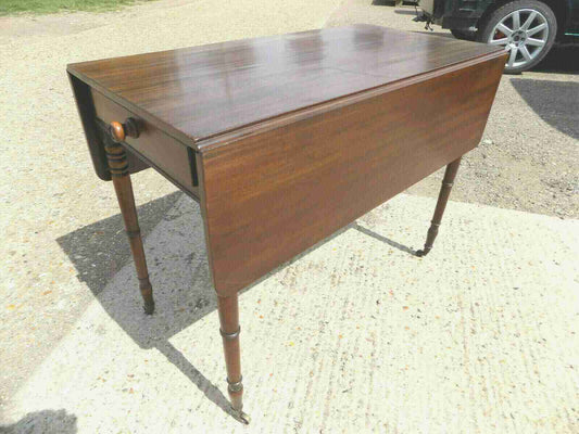 Antique Victorian mahogany extending Pembroke table with drop sides