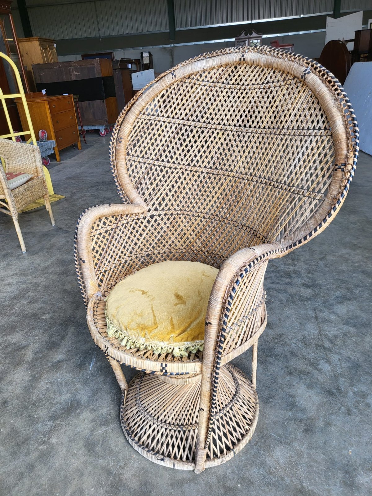 Vintage cane wicker round high back peacock arm chair