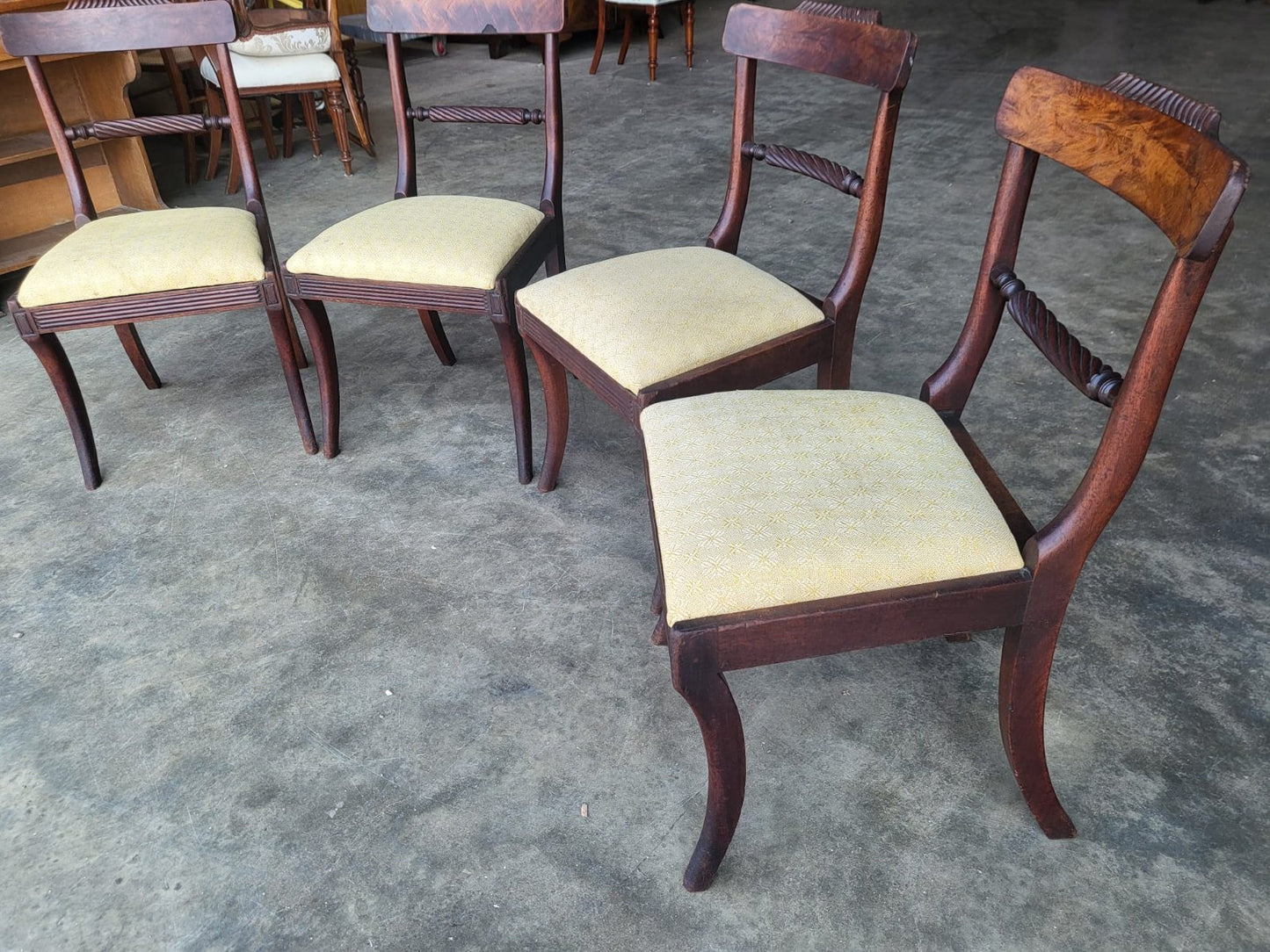Four small antique Georgian dining chairs sabre leg