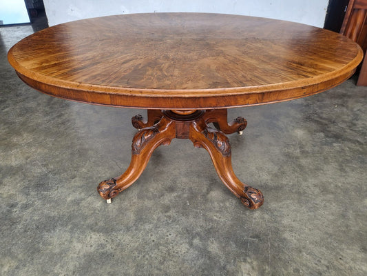 Antique Victorian oval tilt top walnut pedestal dining table seat to 6