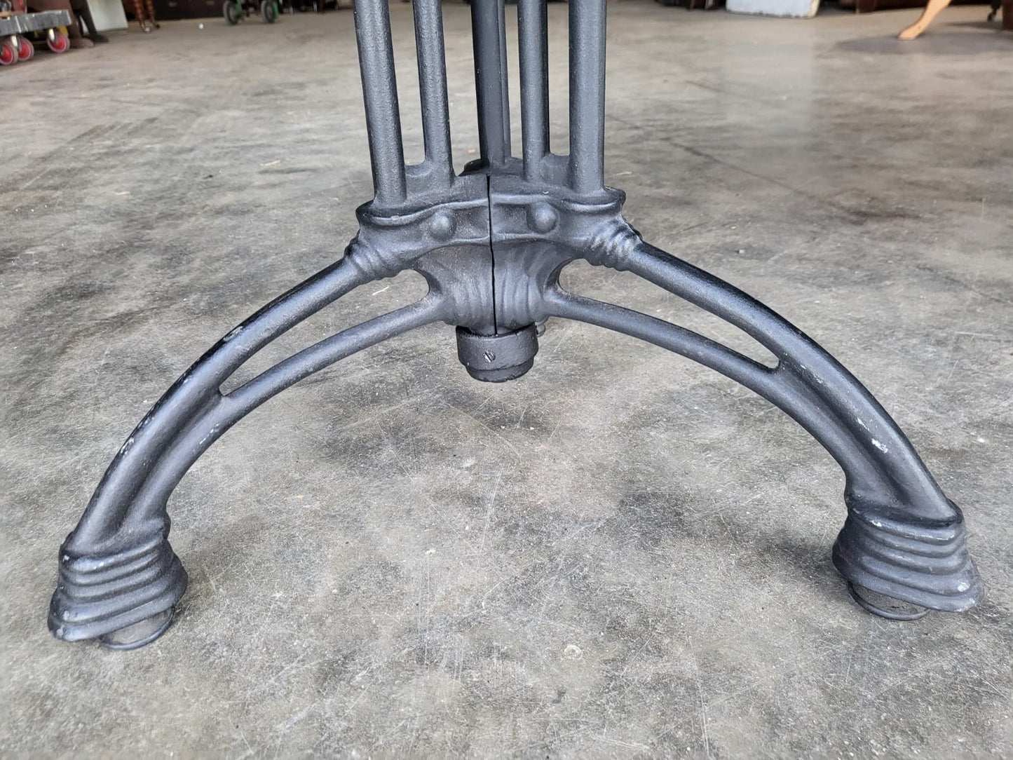 Two black round cast iron bistro dining occasional tables PRICE X 1