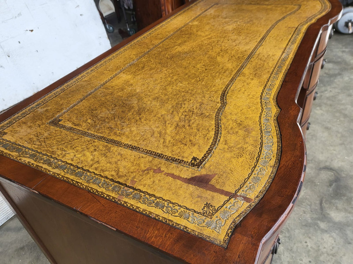 Antique repro small bow front desk 9 drawers leather top