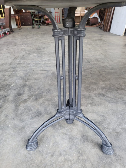 Two black round cast iron bistro dining occasional tables PRICE X 1