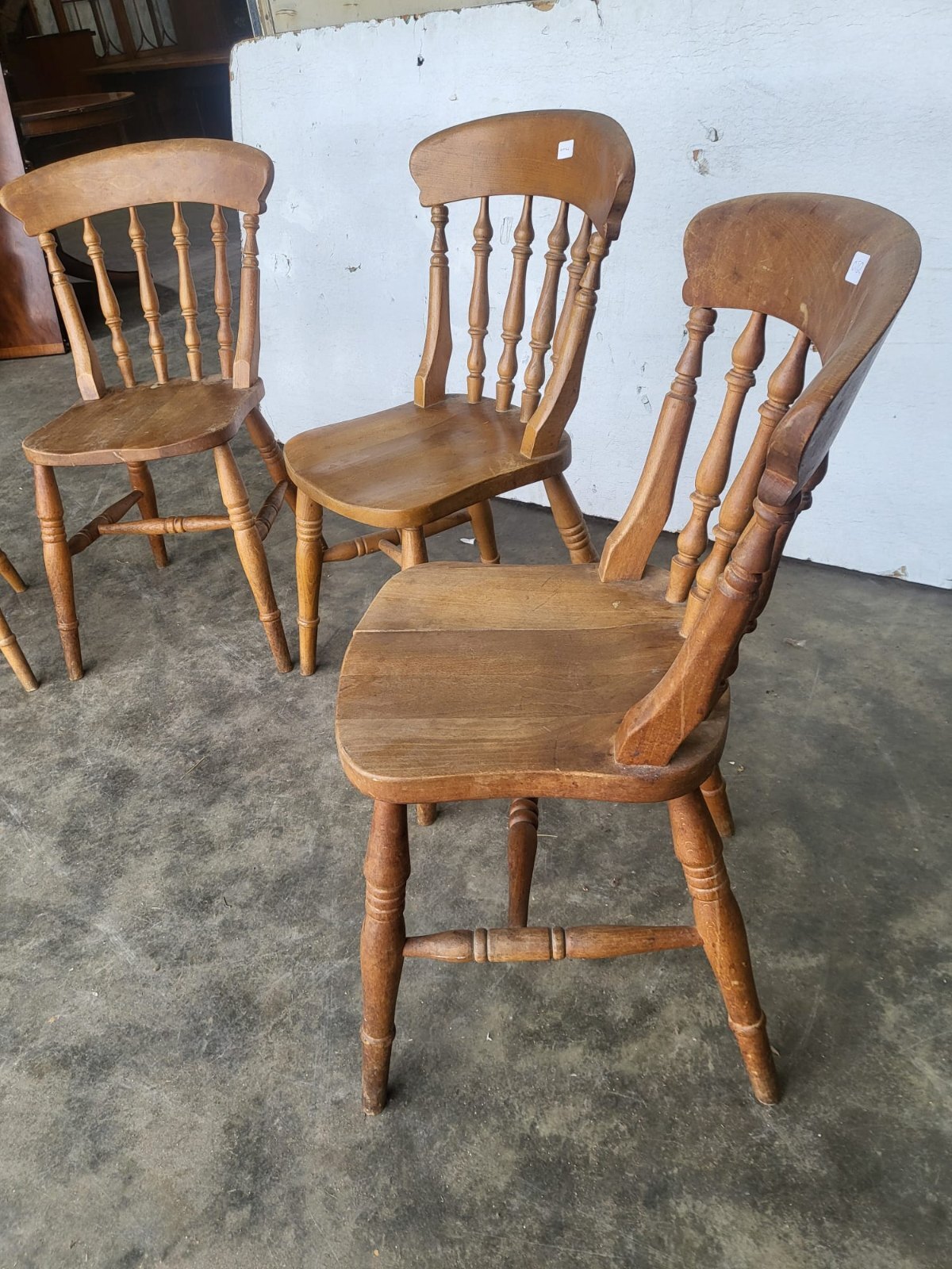 Four beech wooden stick back kitchen country dining chairs