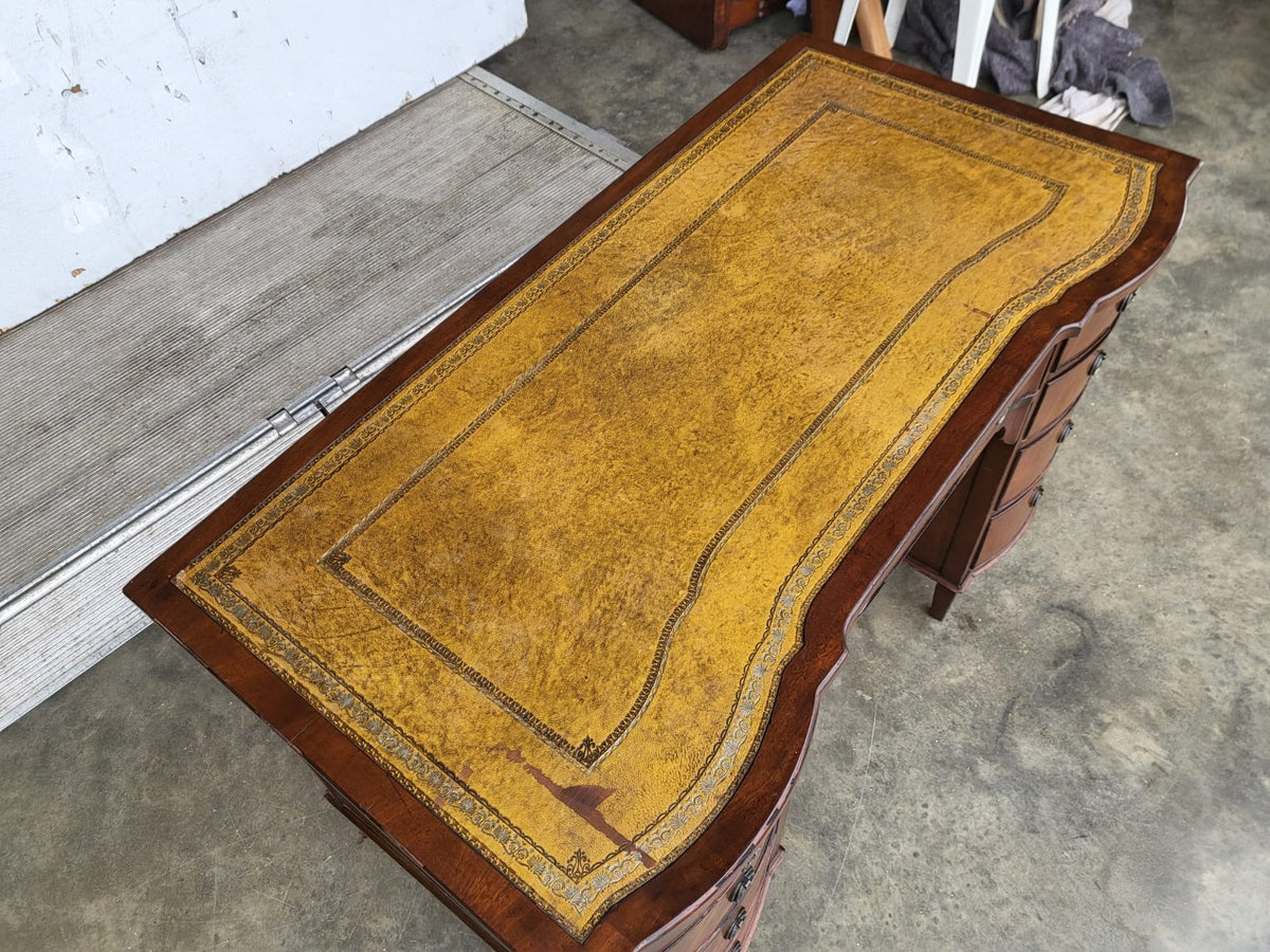 Antique repro small bow front desk 9 drawers leather top