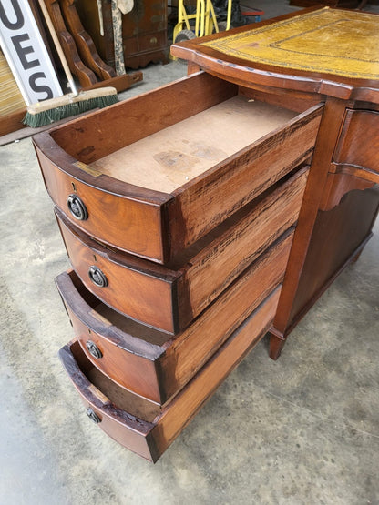 Antique repro small bow front desk 9 drawers leather top