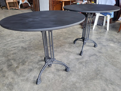 Two black round cast iron bistro dining occasional tables PRICE X 1