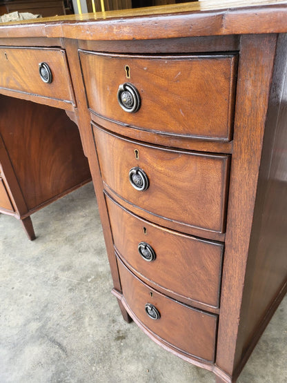 Antique repro small bow front desk 9 drawers leather top