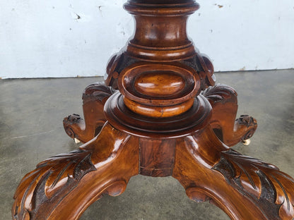 Antique Victorian oval tilt top walnut pedestal dining table seat to 6