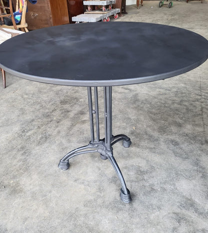 Two black round cast iron bistro dining occasional tables PRICE X 1