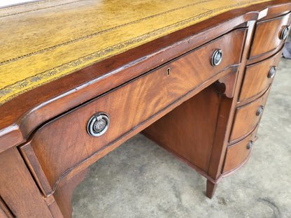 Antique repro small bow front desk 9 drawers leather top