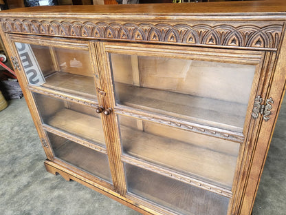 Vintage oak carved 2 door glazed low bookcase cabinet