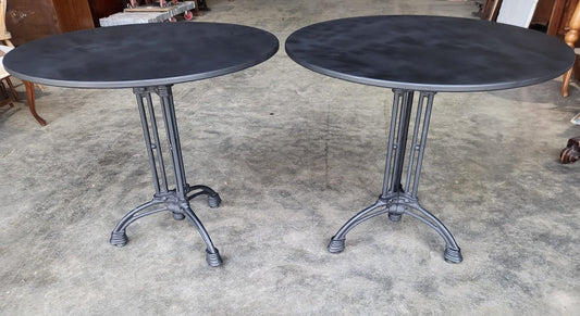 Two black round cast iron bistro dining occasional tables PRICE X 1