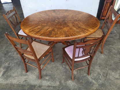 Antique Victorian oval tilt top walnut pedestal dining table seat to 6