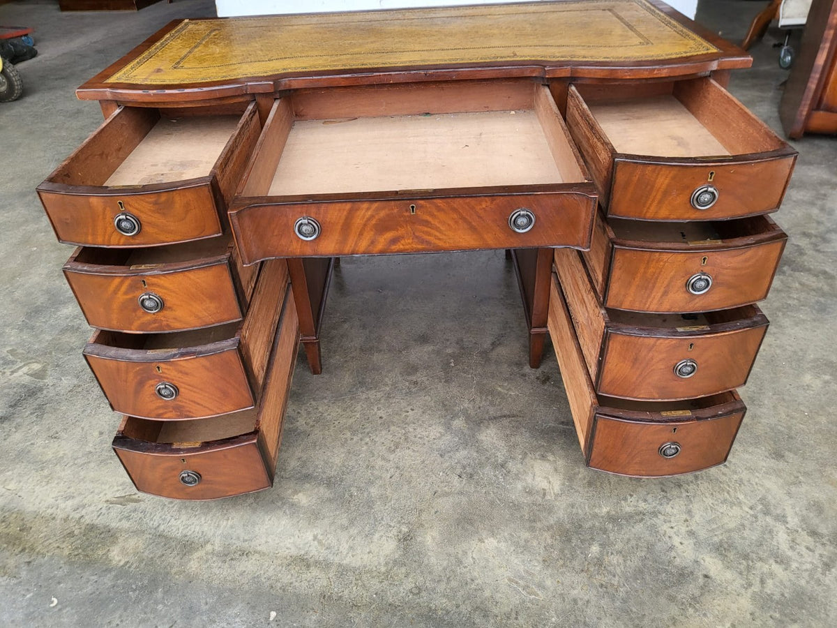 Antique repro small bow front desk 9 drawers leather top