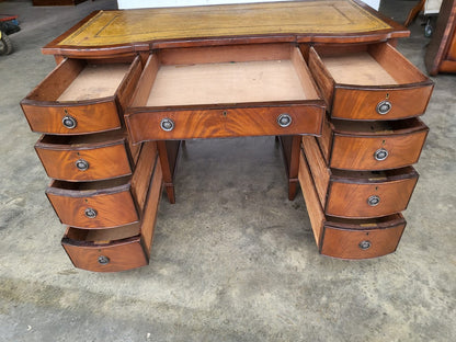 Antique repro small bow front desk 9 drawers leather top