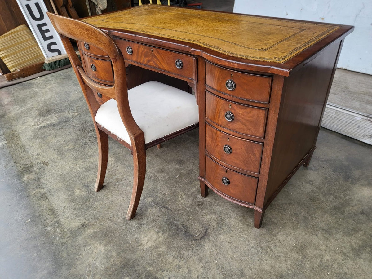 Antique repro small bow front desk 9 drawers leather top