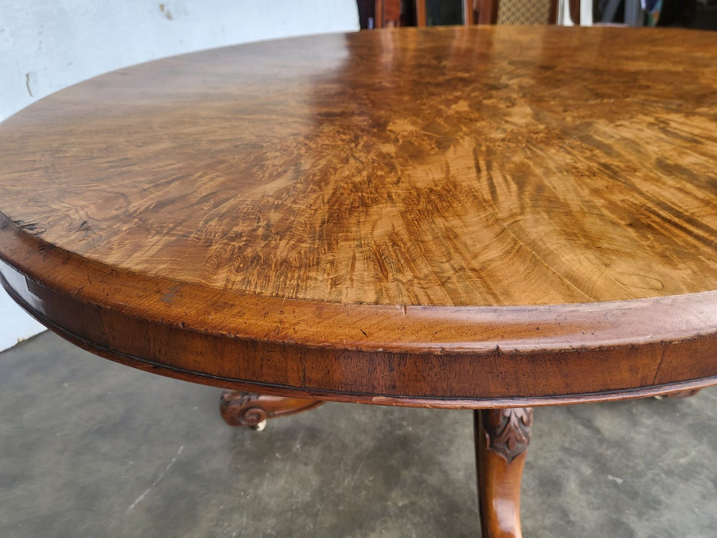 Antique Victorian oval tilt top walnut pedestal dining table seat to 6