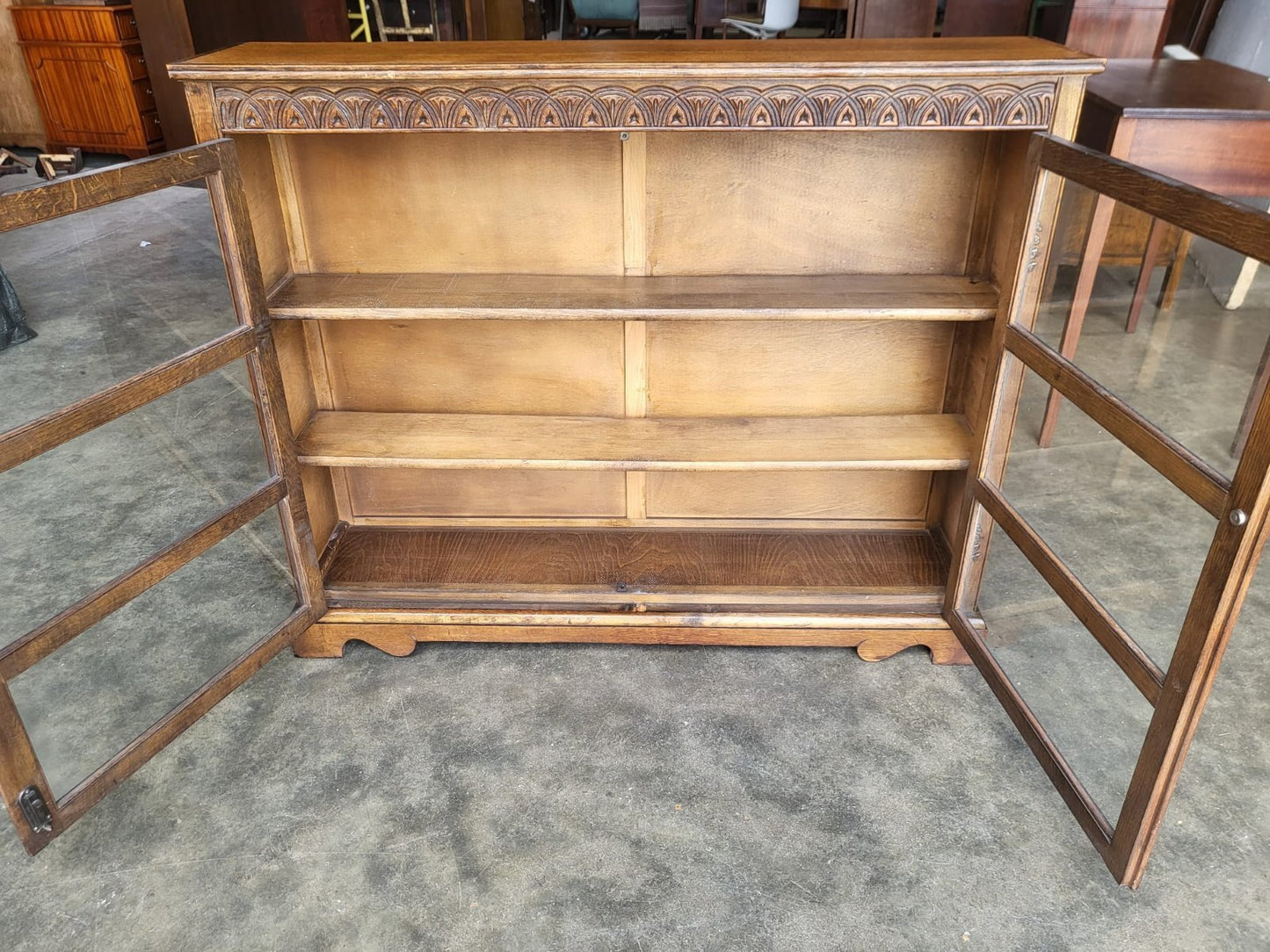 Vintage oak carved 2 door glazed low bookcase cabinet