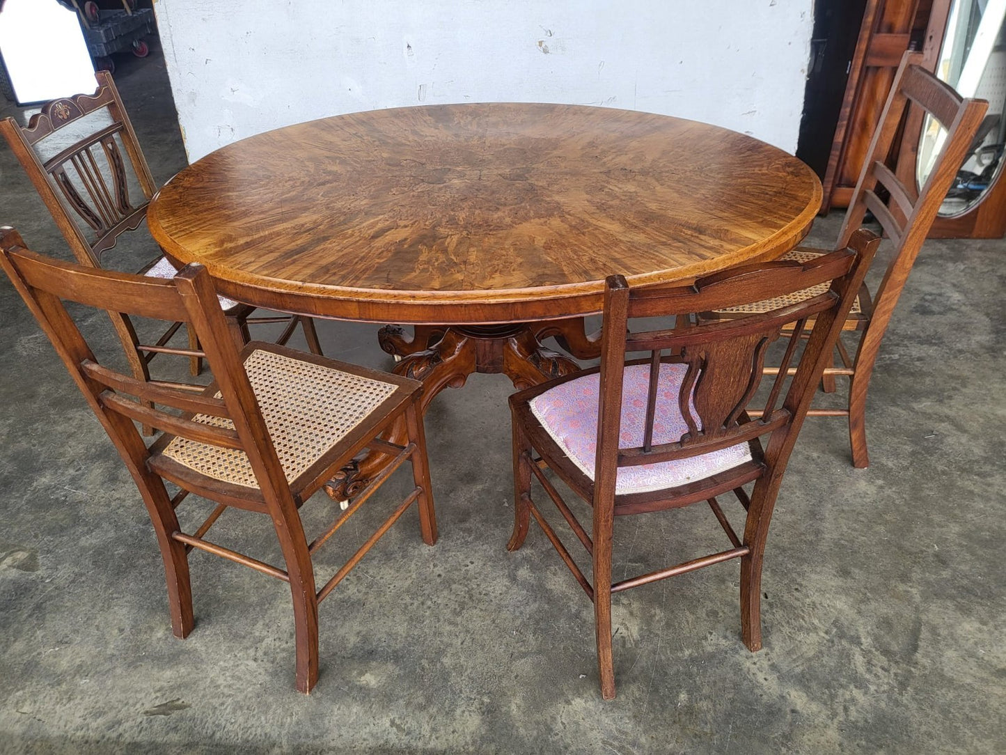 Antique Victorian oval tilt top walnut pedestal dining table seat to 6