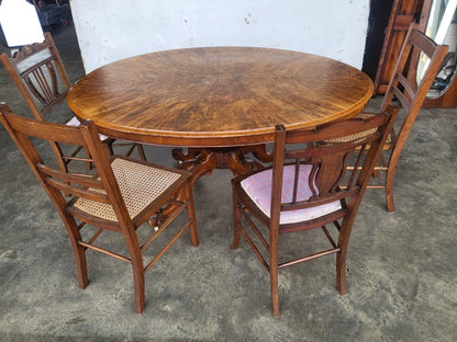 Antique Victorian oval tilt top walnut pedestal dining table seat to 6