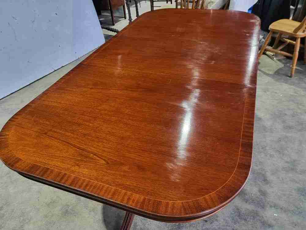 Antique repro mahogany twin pedestal extending D end dining table
