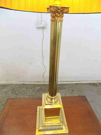 Large brass table lamp with black shade