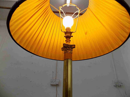 Large brass table lamp with black shade