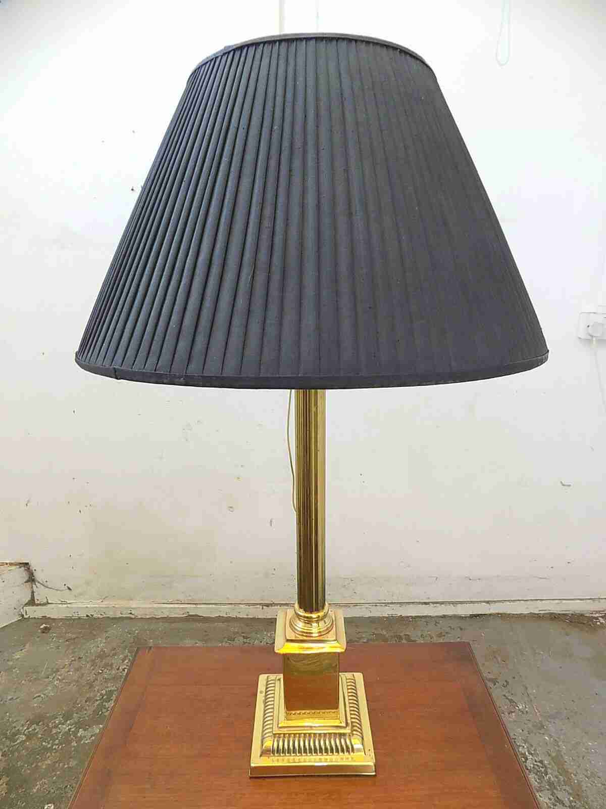 Large brass table lamp with black shade