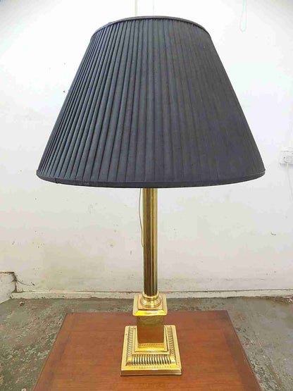 Large brass table lamp with black shade